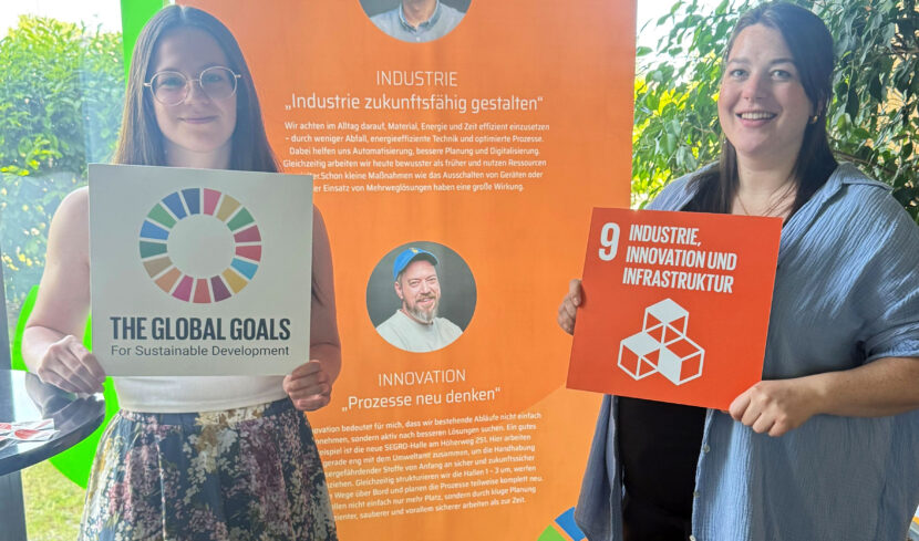 Viviane Saifert und Henriette Grunwald aus dem Team Nachhaltigkeitsmanagement im SDG-Lab in unserer Kantine zum Schwerpunkt SDG 9 „Industrie, Innovation und Infrastruktur“.