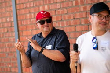 The two managing directors are applauding